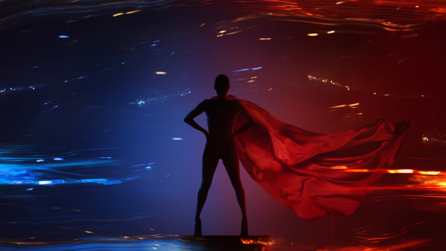 A caped superhero silhouette standing against streaking red and blue light
