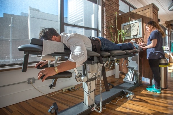 Spinal decompression therapy being used for treatment of herniated disc in Brooklyn, NY at Physio Logic NYC.